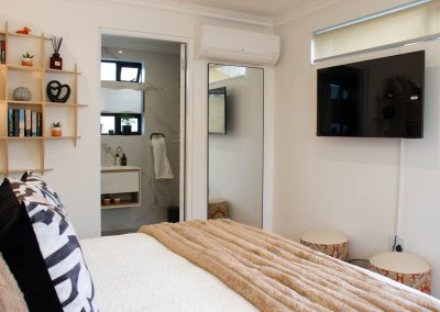 Bedroom decor with bathroom entrance view